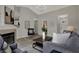 Bright living room featuring vaulted ceilings, fireplace, and modern decor at 7783 Park N Ct, Indianapolis, IN 46260