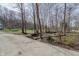 Beautiful creek view from the roadside, showcasing the property's natural water feature at 7980 S State Road 135, Columbus, IN 47201