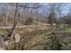 A picturesque creek flows through the property, adding a natural element and ambiance at 7980 S State Road 135, Columbus, IN 47201