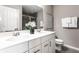 Spacious bathroom featuring double sinks, a large mirror, and neutral color scheme at 8405 Whitaker Valley Blvd, Indianapolis, IN 46237