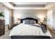 A beautiful bedroom shows coordinated nightstands, lamps, and pillows for a well-designed space at 8405 Whitaker Valley Blvd, Indianapolis, IN 46237