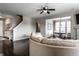 Open-concept living space with a view of the dining area and staircase at 8405 Whitaker Valley Blvd, Indianapolis, IN 46237