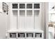 Well-organized mudroom with cubbies, hooks, and storage bins, perfect for keeping belongings tidy at 8405 Whitaker Valley Blvd, Indianapolis, IN 46237
