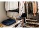 Well-organized walk-in closet with shelves, hanging rods, and storage for clothing and accessories at 8405 Whitaker Valley Blvd, Indianapolis, IN 46237