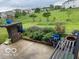 Beautiful backyard featuring a lovely garden, lush green lawn, and a stone patio at 8744 N Aspen Way, McCordsville, IN 46055