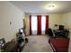 Bedroom featuring neutral carpet, a desk, and bright window at 8744 N Aspen Way, McCordsville, IN 46055