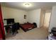 Bedroom featuring neutral carpet, a desk, and bright window at 8744 N Aspen Way, McCordsville, IN 46055