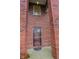 Close-up of the home's front door, framed by brick columns and a window above at 8744 N Aspen Way, McCordsville, IN 46055