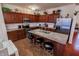 Spacious kitchen with granite countertops, stainless steel appliances and wooden cabinets at 8744 N Aspen Way, McCordsville, IN 46055