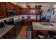 Spacious kitchen featuring stainless steel appliances, granite countertops and plenty of cabinet space at 8744 N Aspen Way, McCordsville, IN 46055