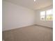 Comfortable bedroom with neutral carpet and a large window providing natural light at 895 Saddlebrook Farms Blvd, Whiteland, IN 46184