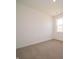 Bright, carpeted bedroom with a large window at 895 Saddlebrook Farms Blvd, Whiteland, IN 46184
