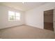 Bright bedroom with a window and carpet, creating a cozy and comfortable space at 895 Saddlebrook Farms Blvd, Whiteland, IN 46184