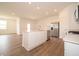 Eat in kitchen features a large island, stainless steel appliances, and bright white cabinets at 895 Saddlebrook Farms Blvd, Whiteland, IN 46184