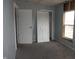 This bedroom features a closet with folding doors and one window for natural light at 917 W 27Th St, Indianapolis, IN 46208