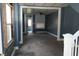 View of the empty living room from staircase at 917 W 27Th St, Indianapolis, IN 46208