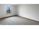 Clean bedroom with carpet and a window providing ample natural light to the room at 9237 Stones Ferry Pl, Indianapolis, IN 46278