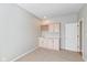 Additional living space with bar area and access to another room at 9544 Huntington Ln, Indianapolis, IN 46260