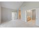 Large main bedroom with attached bath and doors to outside patio at 9544 Huntington Ln, Indianapolis, IN 46260