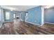 Spacious living room with hardwood floors, ample natural light, and an open floor plan at 9705 Shasta Dr, Fishers, IN 46038