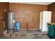 This utility room features modern water heater, well system, and ample storage at 10327 Old National Rd, Indianapolis, IN 46231
