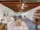 Finished basement provides ample space for recreation with a lounge and game area at 1035 N Audubon Rd, Indianapolis, IN 46219