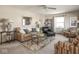 Cozy living room with neutral tones, comfortable seating and a ceiling fan at 1035 N Audubon Rd, Indianapolis, IN 46219
