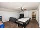 This carpeted bonus room includes an air hockey table, sectional sofa, TV and neutral paint at 1083 Sugar Maple Dr, Greenwood, IN 46143