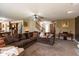 Cozy living room with an open-concept design, seamless transition to the kitchen at 1083 Sugar Maple Dr, Greenwood, IN 46143