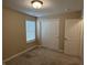 Bedroom featuring a closet, window, and neutral walls for a bright and functional living space at 10869 Spirit Dr, Ingalls, IN 46048
