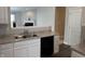 Kitchen with granite countertops, white cabinets, and stainless steel sink at 10869 Spirit Dr, Ingalls, IN 46048