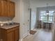 Bright breakfast nook area featuring an eat-in area and updated floors at 10949 Harness Way, Indianapolis, IN 46239