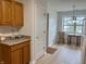 Bright kitchen nook with modern flooring, window, and decorative lighting, perfect for casual dining at 10949 Harness Way, Indianapolis, IN 46239