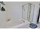Modern bathroom with a shower, a separate tub, and tile flooring at 11149 Titania Ct, Noblesville, IN 46060