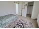 Bright bedroom with carpet floors and a comfortable bed, and a closet for storage at 11149 Titania Ct, Noblesville, IN 46060