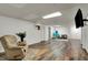 Wide shot of a partially finished basement featuring updated flooring and walls at 1123 Woodbridge Ln, Indianapolis, IN 46260