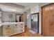 This kitchen features wood cabinets, stainless steel appliances, and a stainless fridge at 1123 Woodbridge Ln, Indianapolis, IN 46260