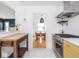 Modern kitchen offering stainless steel appliances and an island with a butcher block top at 1139 N Butler Ave, Indianapolis, IN 46219