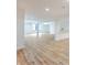 Spacious basement with an open layout, ready for customization with a bar, columns, and a window view at 11640 Ansley Ct, Zionsville, IN 46077