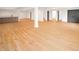 Open basement area with modern flooring, a stylish bar area, and finished doors at 11640 Ansley Ct, Zionsville, IN 46077