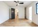 Bright bedroom features hardwood floors, recessed lighting, and open doorway to a spacious hallway at 11640 Ansley Ct, Zionsville, IN 46077