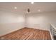 Versatile bonus room with hardwood floors, recessed lighting, and neutral color scheme at 11640 Ansley Ct, Zionsville, IN 46077