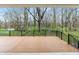 Expansive deck with black railing overlooking wooded backyard, perfect for outdoor entertaining at 11640 Ansley Ct, Zionsville, IN 46077