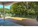 Spacious deck overlooking lush backyard with mature trees and an in-ground pool at 11640 Ansley Ct, Zionsville, IN 46077