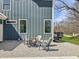 Modern home exterior with a fire pit and chairs, perfect for cozy outdoor gatherings at 11640 Ansley Ct, Zionsville, IN 46077