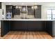 Spacious kitchen island with modern fixtures, ample storage, and sleek design at 11640 Ansley Ct, Zionsville, IN 46077
