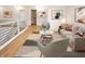 Cozy living room with bright decor, comfortable seating, and eye-catching art creates a welcoming space at 11640 Ansley Ct, Zionsville, IN 46077