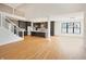 Bright and airy living room with an open floor plan and modern kitchen features at 11640 Ansley Ct, Zionsville, IN 46077