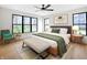 Serene main bedroom features large windows, wood floors, and stylish decor at 11640 Ansley Ct, Zionsville, IN 46077
