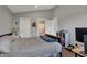 Bedroom with ensuite bathroom, neutral walls and carpet at 12030 Driftstone Dr, Fishers, IN 46037